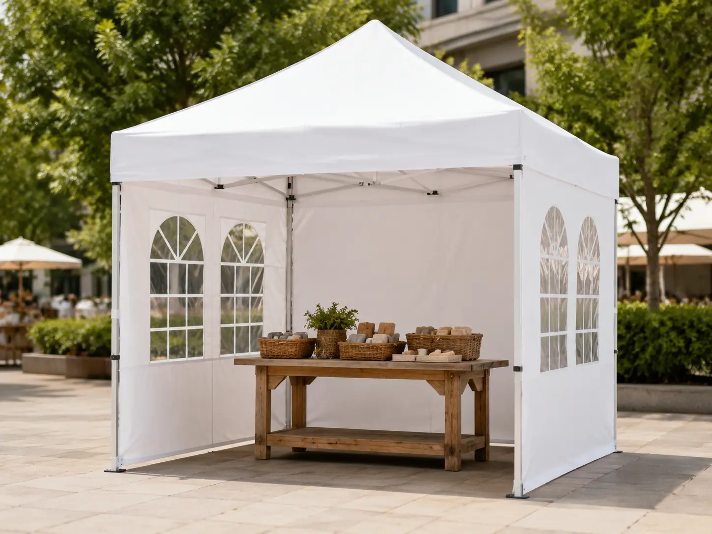 White commercial pop-up canopy tent with removable sidewalls and clear arched windows