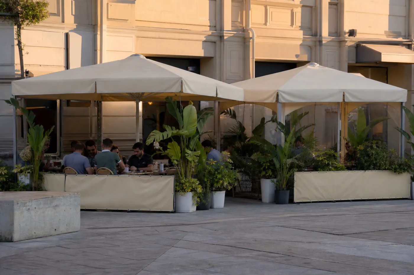 Pop-up canopy used as food and beverage shade
