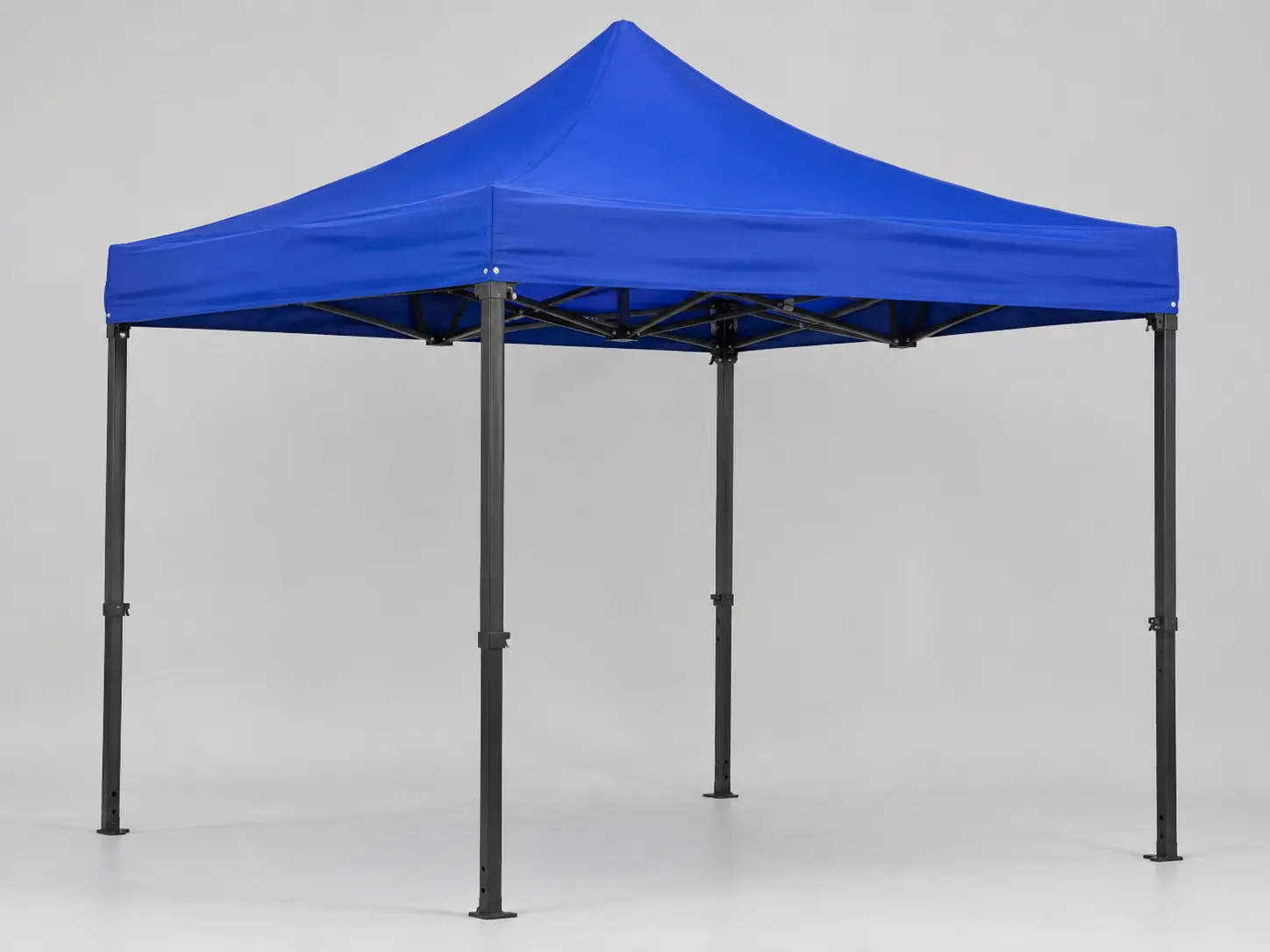 Royal blue heavy-duty steel pop-up canopy tent photographed in a clean studio